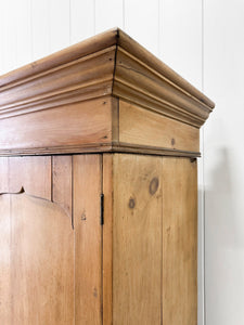 An 18th Century English Pine Linen Press Cupboard