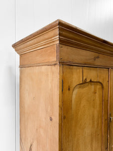 An 18th Century English Pine Linen Press Cupboard