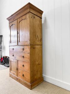 An 18th Century English Pine Linen Press Cupboard