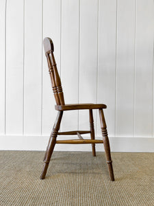 An Antique Set of 4 Spindle Back Chairs