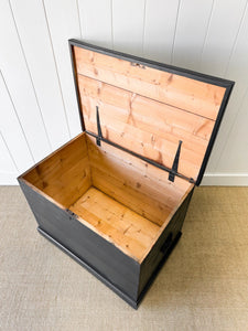 An English Pine Ebonized Blanket Box