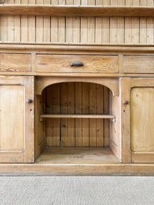 An Early 19th Century Monumental Pine Welsh Dresser or Cupboard