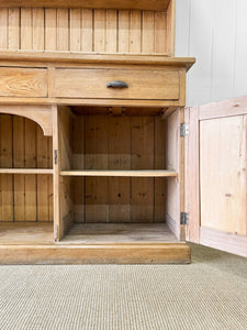 An Early 19th Century Monumental Pine Welsh Dresser or Cupboard