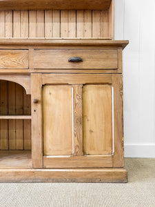 An Early 19th Century Monumental Pine Welsh Dresser or Cupboard