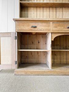 An Early 19th Century Monumental Pine Welsh Dresser or Cupboard