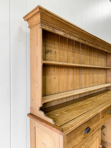 An Early 19th Century Monumental Pine Welsh Dresser or Cupboard