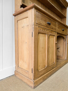 An Early 19th Century Monumental Pine Welsh Dresser or Cupboard