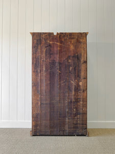 A Handsome English 19th Pine Cupboard with Dark Wooden Knobs