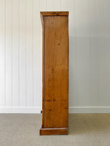 A Handsome English 19th Pine Cupboard with Dark Wooden Knobs