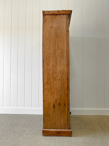 A Handsome English 19th Pine Cupboard with Dark Wooden Knobs