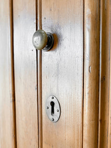 A Handsome English 19th Pine Cupboard with Dark Wooden Knobs