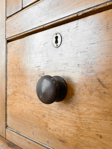 A Handsome English 19th Pine Cupboard with Dark Wooden Knobs