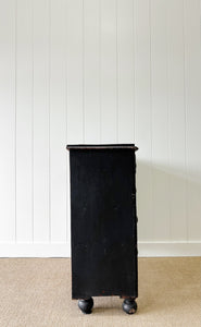 An Ebonized Antique English Chest of Drawers/Dresser