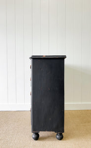 An Ebonized Antique English Chest of Drawers/Dresser