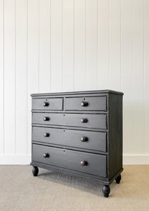 An Ebonized Antique English Chest of Drawers/Dresser