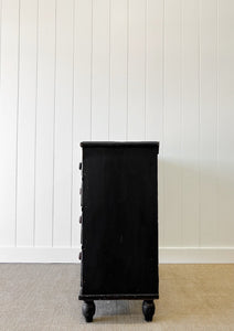 An Ebonized Antique English Chest of Drawers/Dresser