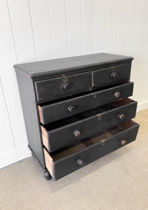 An Ebonized Antique English Chest of Drawers/Dresser