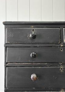 An Ebonized Antique English Chest of Drawers/Dresser