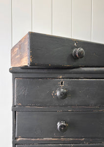 An Ebonized Antique English Chest of Drawers/Dresser