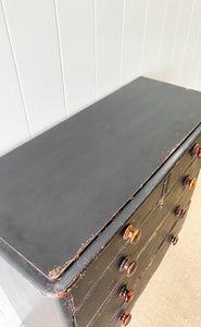 An Ebonized Antique English Chest of Drawers/Dresser