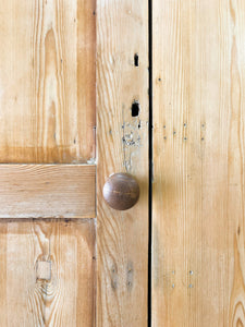 A Handsome English 19th Pine Cupboard with Dark Wooden Knobs