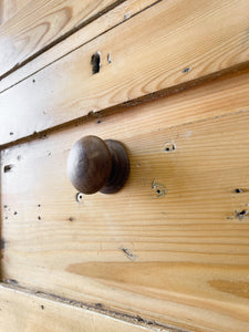 A Handsome English 19th Pine Cupboard with Dark Wooden Knobs