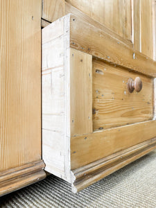 A Handsome English 19th Pine Cupboard with Dark Wooden Knobs