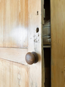 A Handsome English 19th Pine Cupboard with Dark Wooden Knobs