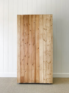 A Handsome English 19th Pine Cupboard with Dark Wooden Knobs