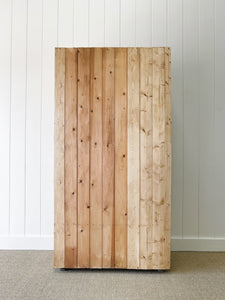 A Handsome English 19th Pine Cupboard with Dark Wooden Knobs