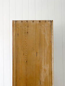 A Handsome English 19th Pine Cupboard with Dark Wooden Knobs