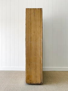 A Handsome English 19th Pine Cupboard with Dark Wooden Knobs