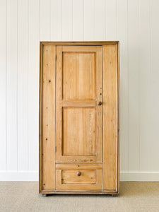 A Handsome English 19th Pine Cupboard with Dark Wooden Knobs