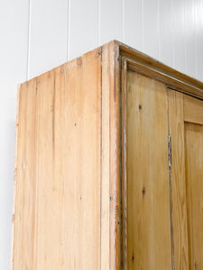 A Handsome English 19th Pine Cupboard with Dark Wooden Knobs