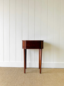 A Georgian Mahogany Sewing Table with Rising Lid