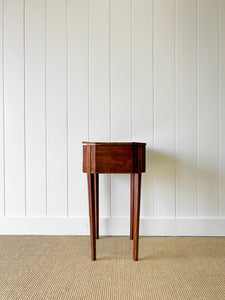 A Georgian Mahogany Sewing Table with Rising Lid