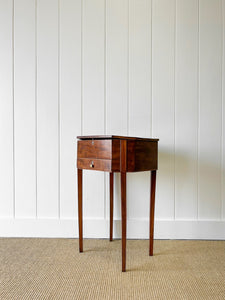 A Georgian Mahogany Sewing Table with Rising Lid