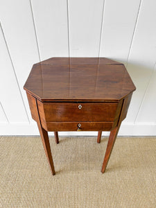 A Georgian Mahogany Sewing Table with Rising Lid