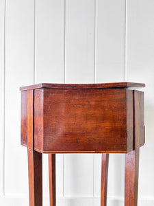 A Georgian Mahogany Sewing Table with Rising Lid