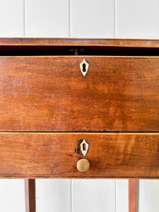 A Georgian Mahogany Sewing Table with Rising Lid