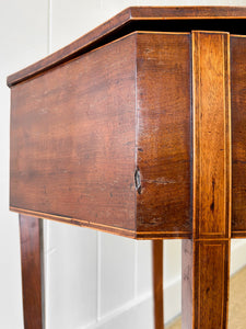 A Georgian Mahogany Sewing Table with Rising Lid