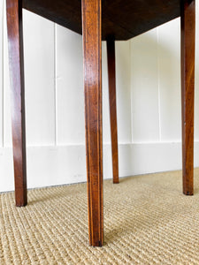 A Georgian Mahogany Sewing Table with Rising Lid