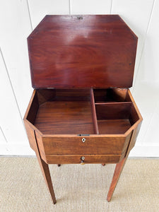 A Georgian Mahogany Sewing Table with Rising Lid