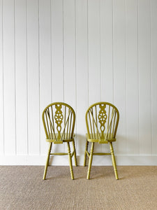 A Set of 4 Antique Ash Wheel Back Side Chairs