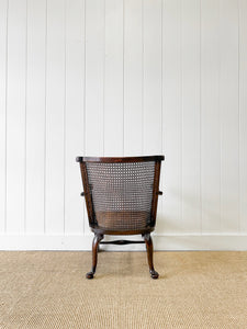 A 19th Century Mahogany Anglo-Indian Caned Arm Chair