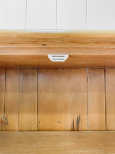 A 19th Century English Pine Bookcase with Arched Doors