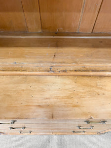 A 19th Century English Pine Bookcase with Arched Doors