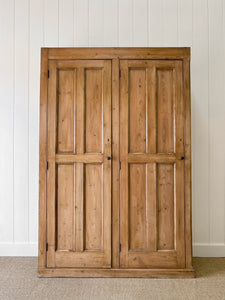 A Large English 19th Century Pine Coat Cupboard