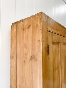 A Large English 19th Century Pine Coat Cupboard