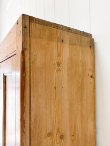 A Large English 19th Century Pine Coat Cupboard